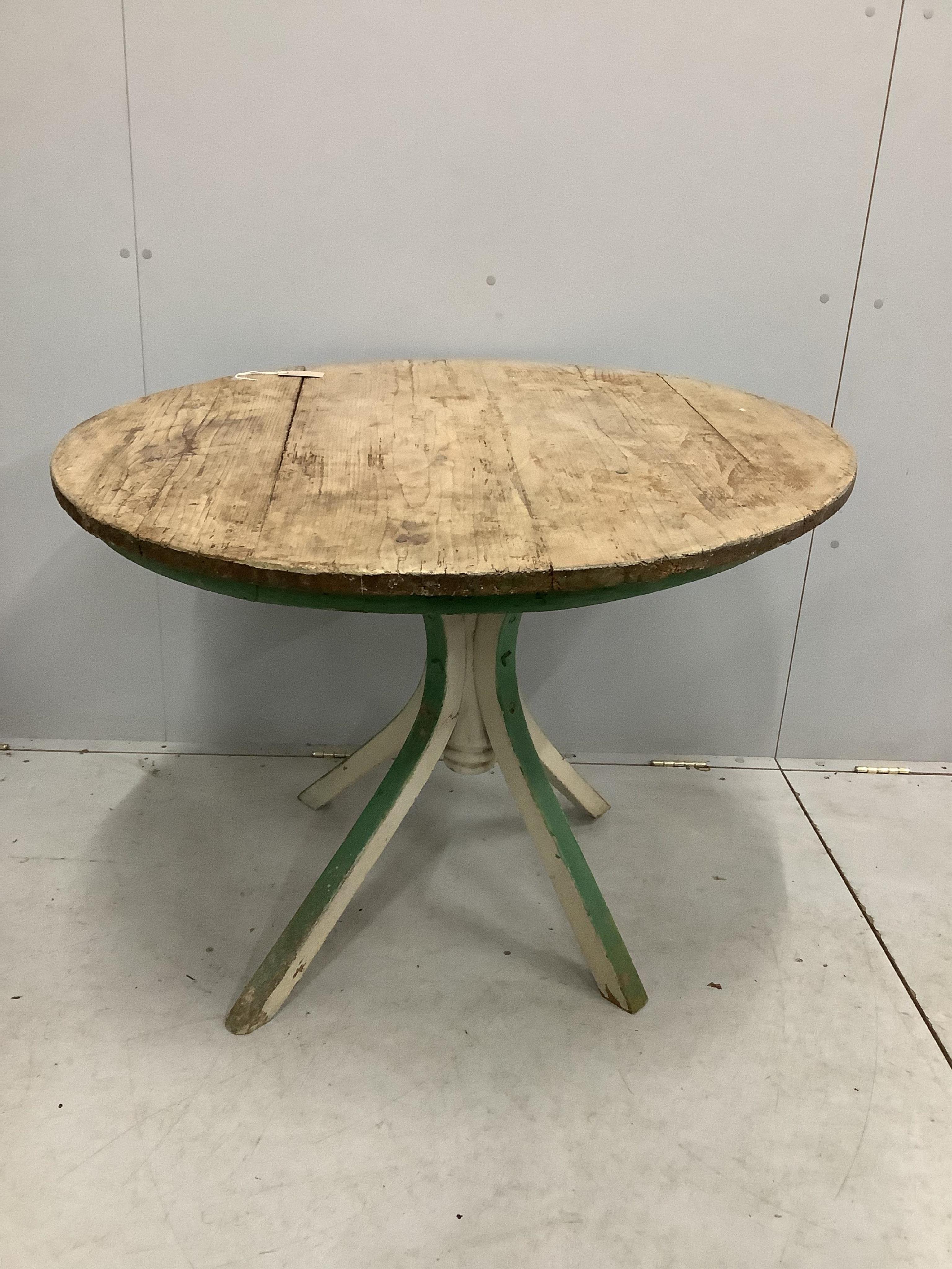 A 19th century circular pine breakfast table, diameter 101cm, height 78cm. Condition - poor to fair